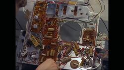 CU HA Woman repairing electronic circuit board / United States Stock Footage