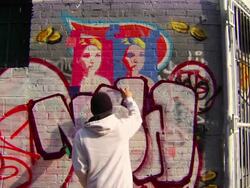 Wide Shot of Graffiti Artist Painting Urban Wall Stock Footage