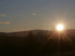 WS View of Sun setting over mountains / Greensboro, Vermont, United States Stock Footage