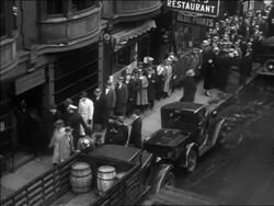 B/W 1933 high angle line of people waiting to get into liquor store / Pennsylvania / repeal of Prohibition Stock Footage
