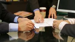 Project manager discussing with team leaders Stock Footage