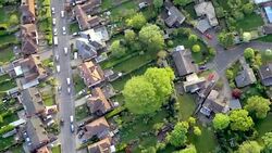 Aerial View Town and Suburbia in Sunshine. HD Stock Footage