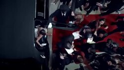 Celebrity couple step out of limousine and sign autographs for fans on red carpet at awards show Stock Footage