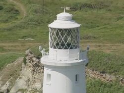 CU AERIAL ZO Shot of light house / Alderney, Channel Isles Stock Footage
