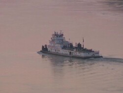 MS TS Boat moving in Hannibal Mississippi river at sunset / Hannibal, Missouri, United States Stock Footage