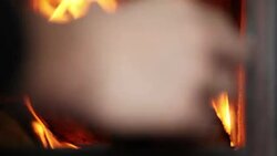 man heating-up an oven Stock Footage