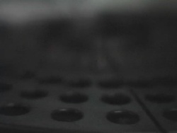 ECU, SELECTIVE FOCUS, Medical samples in bottles rotating on platform Stock Footage