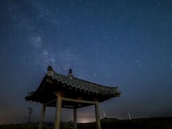View of Korea traditional architecture(Gazebo) in Gangneung and milky way in star field Stock Footage