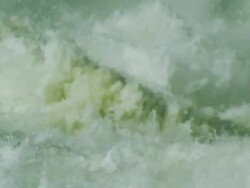 Slow motion dramatic water churning behind dam Stock Footage