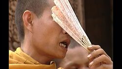 Buddhist monks praying at Angkor Wat News Clip