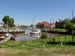 WS View of boats on harbor, North Sea Dithmarschen, / Tonning, Schleswig Holstein, Germany Stock Footage