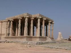 WS Temple at Hemakuta Hill with Virupaksha Temple in background/ Hampi, Karnataka, India Stock Footage