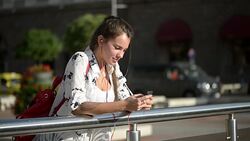 Young woman listening to music Stock Footage