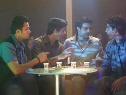 Four young men enjoying in a nightclub Stock Footage