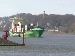 MS Shot of containership on river Elbe near Finkenwerder / Hamburg, Germany Stock Footage