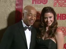 Russell Simmons and Shannon Elizabeth at HBO's Post 2014 Golden Globe Awards Party Stock Footage