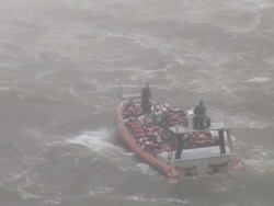 MS View of boat moving on water / IguazÃƒÂº waterfall, ParanÃƒÂ¡, Brasil Stock Footage
