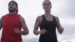 Physically Fit Caucasian Couple in their Thirties Running Stock Footage