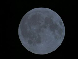 CU Full moon against black sky Stock Footage