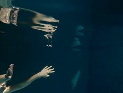 Girl emerge from water Stock Footage