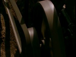 CU Belts turning water pump at salt pan, Gujarat, India Stock Footage