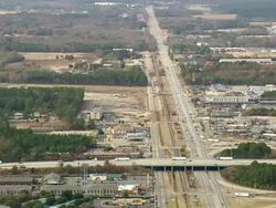WS AERIAL View of 52 Highway with town area / South Carolina, United States Stock Footage