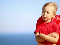 funny boy in superhero costume Stock Footage