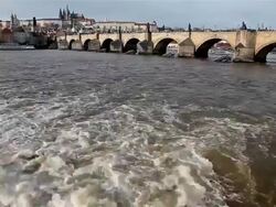 VLTAVA RIVER CHARLES BRIDGE AND ST VITUS CATHEDRAL Stock Footage