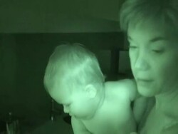 Mother and Baby at Night - Nightvision Camera Stock Footage