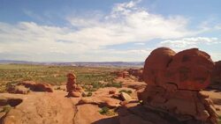 Rise above with aerial shot of the Elephant Arch at The Arches National Park Stock Footage