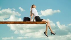 Woman sitting on edge of plank relaxing Stock Footage