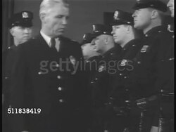 1940: NEW YORK CITY: NIGHT: MS 14th Precinct sign. Policemen in line being inspected by ranking officer. CU Hibernian Ball at Cortelyou Club in Flatbush (Brooklyn) advertisement. Irish Catholic Americans dancing traditional dance in social club. Instructional Video