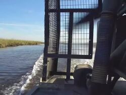 HD SUPER SLOW-MO: Airboat In The Everglades Stock Footage