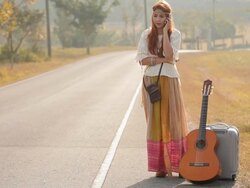 Hippie girl using mobile phone Stock Footage
