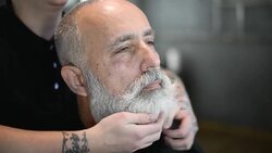 brutal barber clipper mows bearded adult senior hipster Stock Footage