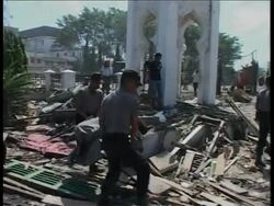 WRAP Bodies, petrol shortages, temporary shelters, aerials; adds rush for food aid News Clip