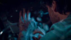 Man in motorcycle workshop building a bike Stock Footage