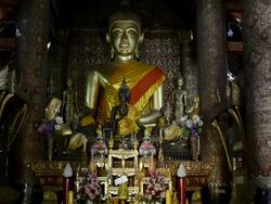 MS Buddha figure in temple / Luang Prabang, Luang Prabang, Laos Stock Footage