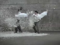 Businessmen fighting with feather pillows Stock Footage