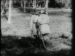 Kaiser Wilhelm II and Archduke Franz Ferdinand talk with one another in a field. Stock Footage