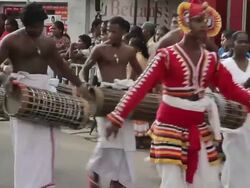 MS PAN Traditional dancers and drummers parade in Seenigama annual Perahern parade AUDIO / Sinigama, Southern Province, Sri Lanka Stock Footage