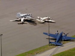AERIAl small planes crashed by storm on runway at Lakefront Airport / New Orleans, Louisiana Stock Footage