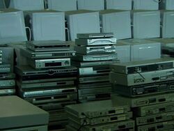 WS View of interior of warehouse with old cd and DVD player and ovens / Lagos, Nigeria Stock Footage