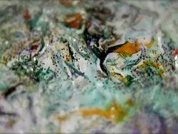 Abstract rotating painting with green glitter Stock Footage