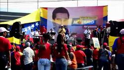 CLEAN : Maduro brandishes Chavez poster News Clip