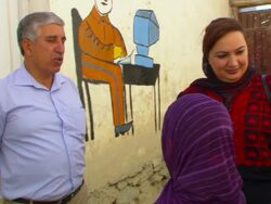 MS PAN Shukria Barakzai listening  supervisors talk with  children at  local care center AUDIO / Kabul, Province, Afghanistan Stock Footage