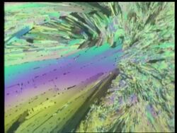 Rotate and zoom in to colourful crystal, fan like crystal shards Stock Footage