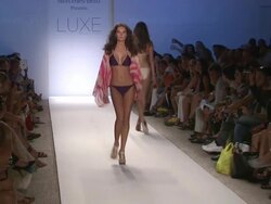 Models walk the runway during the Luxe by Lisa Vogel swimwear 2012 show Stock Footage