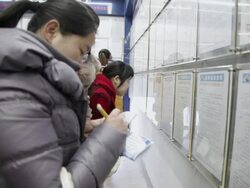 MS Job seeker seeing recruitment informations at employment Fair / xi'an, shaanxi, china Stock Footage