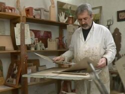 HD DOLLY: Sculpture Artist Looking His Drafts Stock Footage